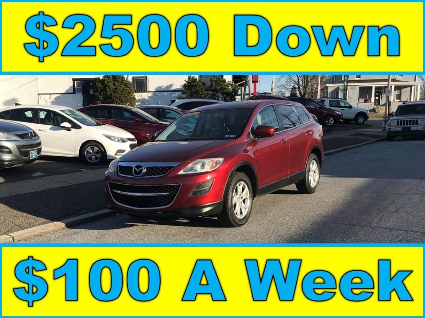 2012 Red /Tan Mazda CX-9 Touring (JM3TB3CV5C0) with an 3.7 V6 engine, Automatic transmission, located at 577 Chester Pike, Prospect Park, PA, 19076, (610) 237-1015, 39.886154, -75.302338 - Photo#0